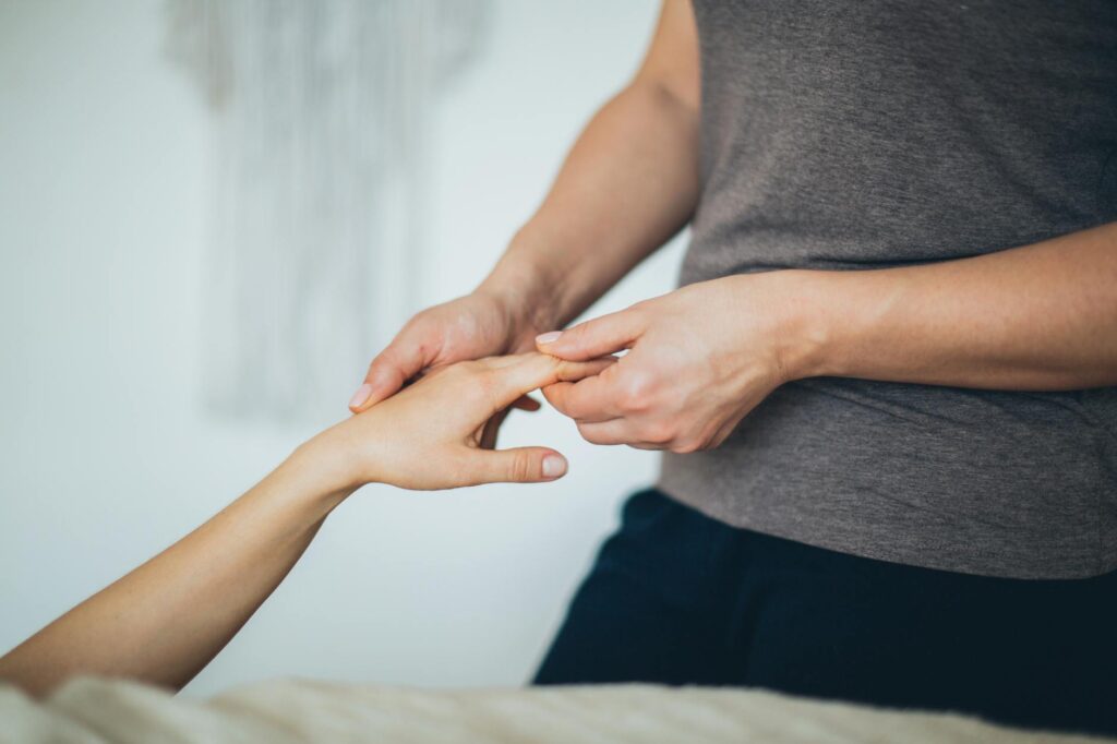 pexels-photo-3865531-3865531 Close-up of a hand massage in a calming spa environment.
